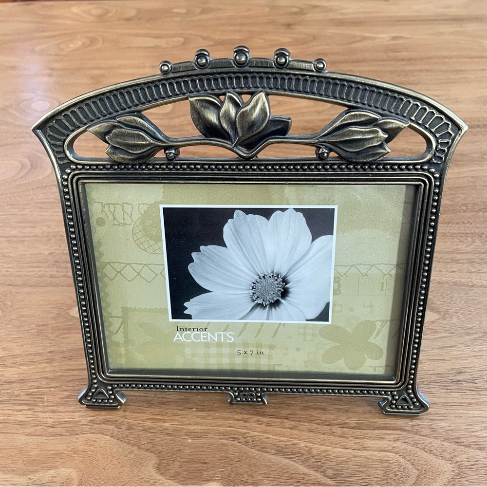 New, metal picture frame.